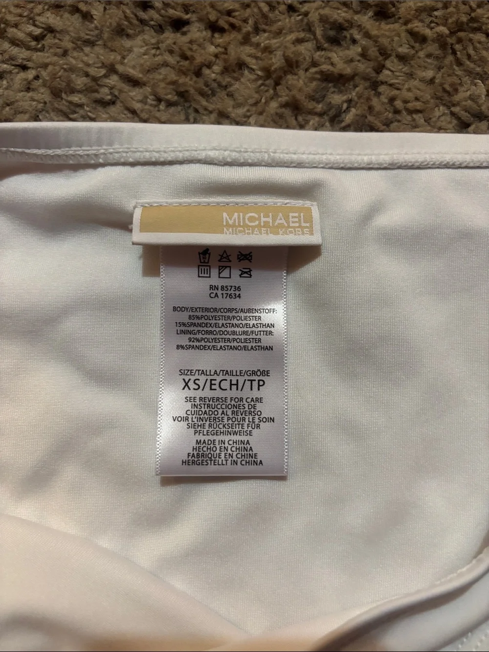 Michael Kors White Bikini Brief with Gold Logo Plaque